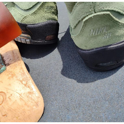 Close-up of modded Nike Air Max Ishod with clean Nike SB lettering