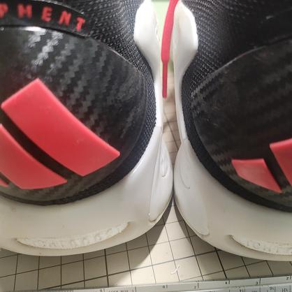 Left: classic Adidas Equipment wordmark, Right: custom Antman logo